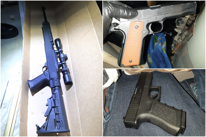 Calgary police say four rifles, a sawed-off shotgun and three replica handguns were recovered following the execution of a search warrant in Temple. 