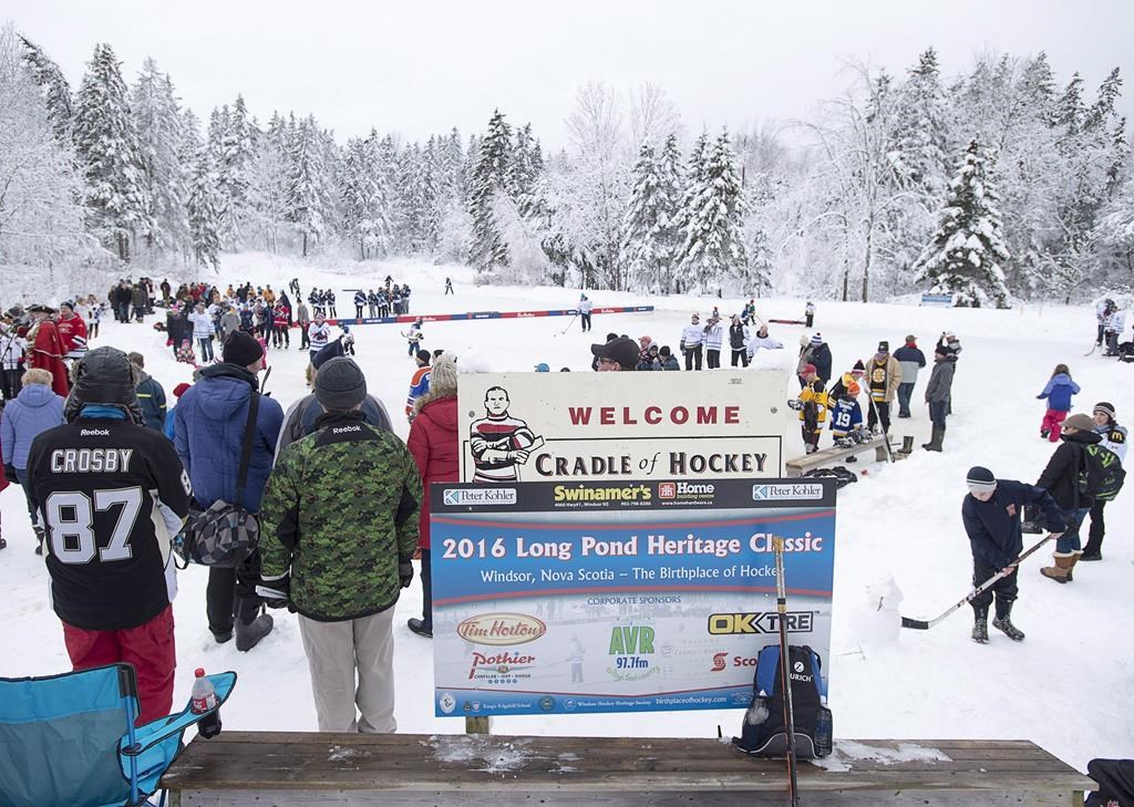 Fans and players attend the Long Pond Heritage Classic in Windsor, N.S. on Saturday, Jan. 30, 2016. THE CANADIAN PRESS/Andrew Vaughan.