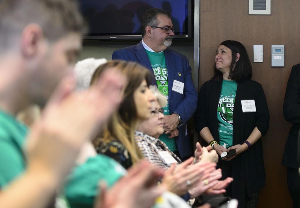 Toby and Bernadine Boulet look at one another as they are recognized during an event for Green Shirt Day and National Organ and Tissue Donation Awareness Week in Ottawa on April 3, 2019. Six people benefitted from organs harvested from the body of Boulet's son Logan, a member of the SJHL's Humboldt Broncos who was among 16 killed when the team's bus collided with a truck in 2018. THE CANADIAN PRESS/Sean Kilpatrick.