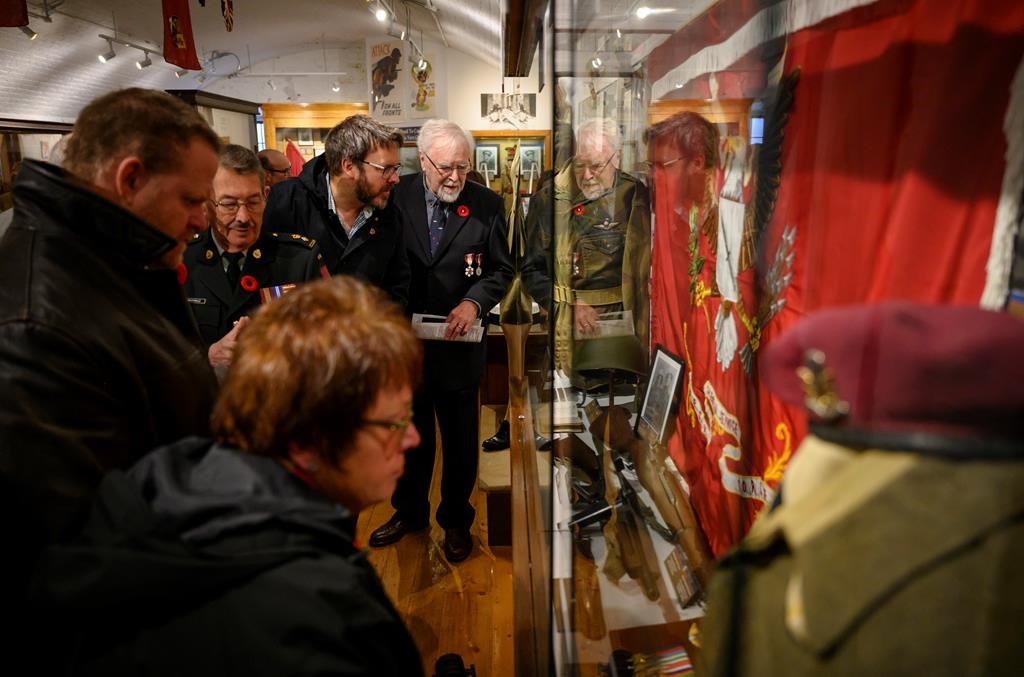 Family and friends of the late Second World War Sergeant Herb Peppard join other members of the military for the unveiling of a new First Special Service Force exhibit featuring Sergeant Peppard's memorabilia at the Army Museum Halifax Citadel in Halifax on Friday, November 8, 2019.