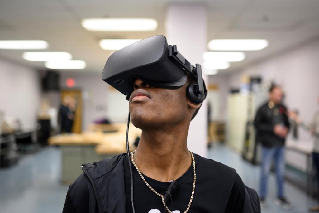 Christian Ofume, a Grade 10 student at Auburn Drive High School, experiences a virtual-reality project meant to teach the history of racism and abuse that took place at the Nova Scotia Home for Colored Children, a former orphanage outside of Halifax, in Dartmouth, N.S. on Wednesday, November 6, 2019.