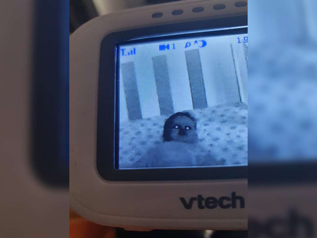 A new parent shared a hilarious photo of her child on a baby monitor looking particularly demonic.