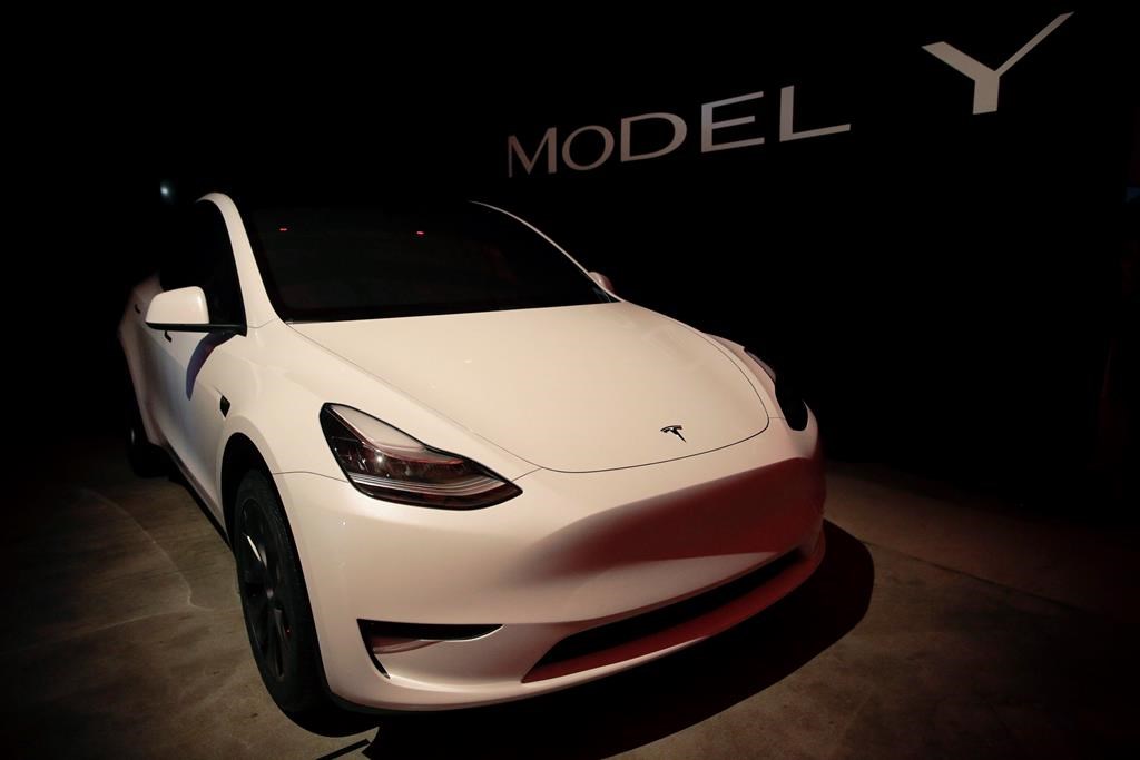 In this March 14, 2019, file photo, Tesla's Model Y is displayed at Tesla's design studio in Hawthorne, Calif.