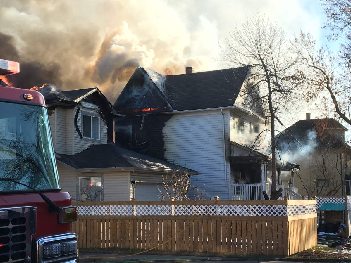 A fire broke out in a house on 93 Street near 107a Avenue in central Edmonton’s McCauley neighbourhood on Monday, November 18, 2019.