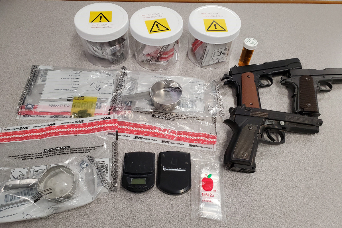 Officers seized suspected fentanyl, methamphetamine, replica firearms, and stolen property.