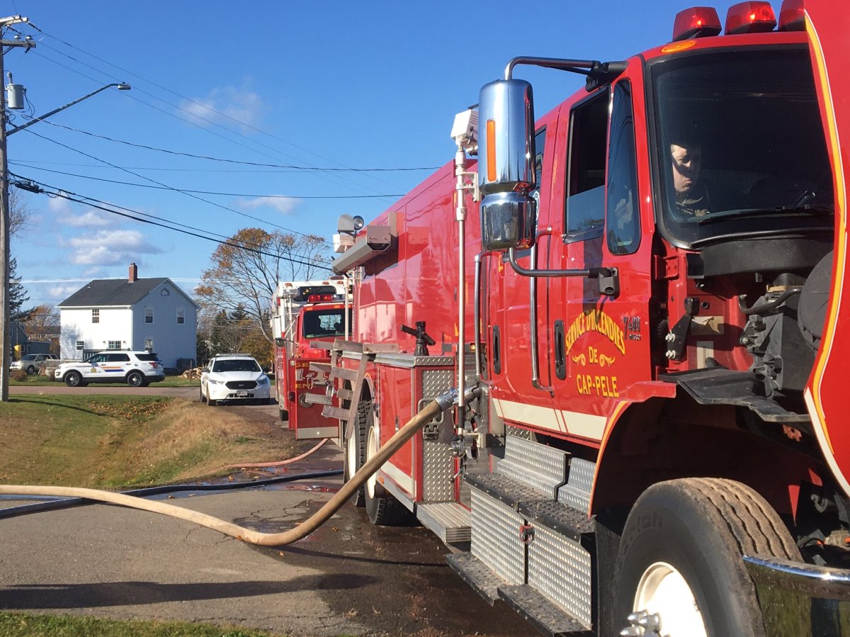 Firefighters battle a blaze at an abandoned seniors' home in Cap-Pelé, N.B., on Nov. 6, 2019. 