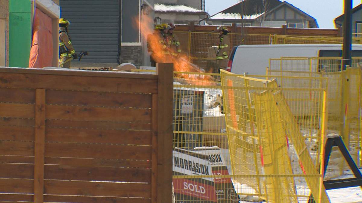 Calgary firefighters on the scene of a gas line fire in Calgary,