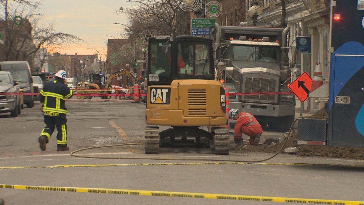 Crews work to locate a gas leak on Notre-Dame Street West. Monday, Nov. 