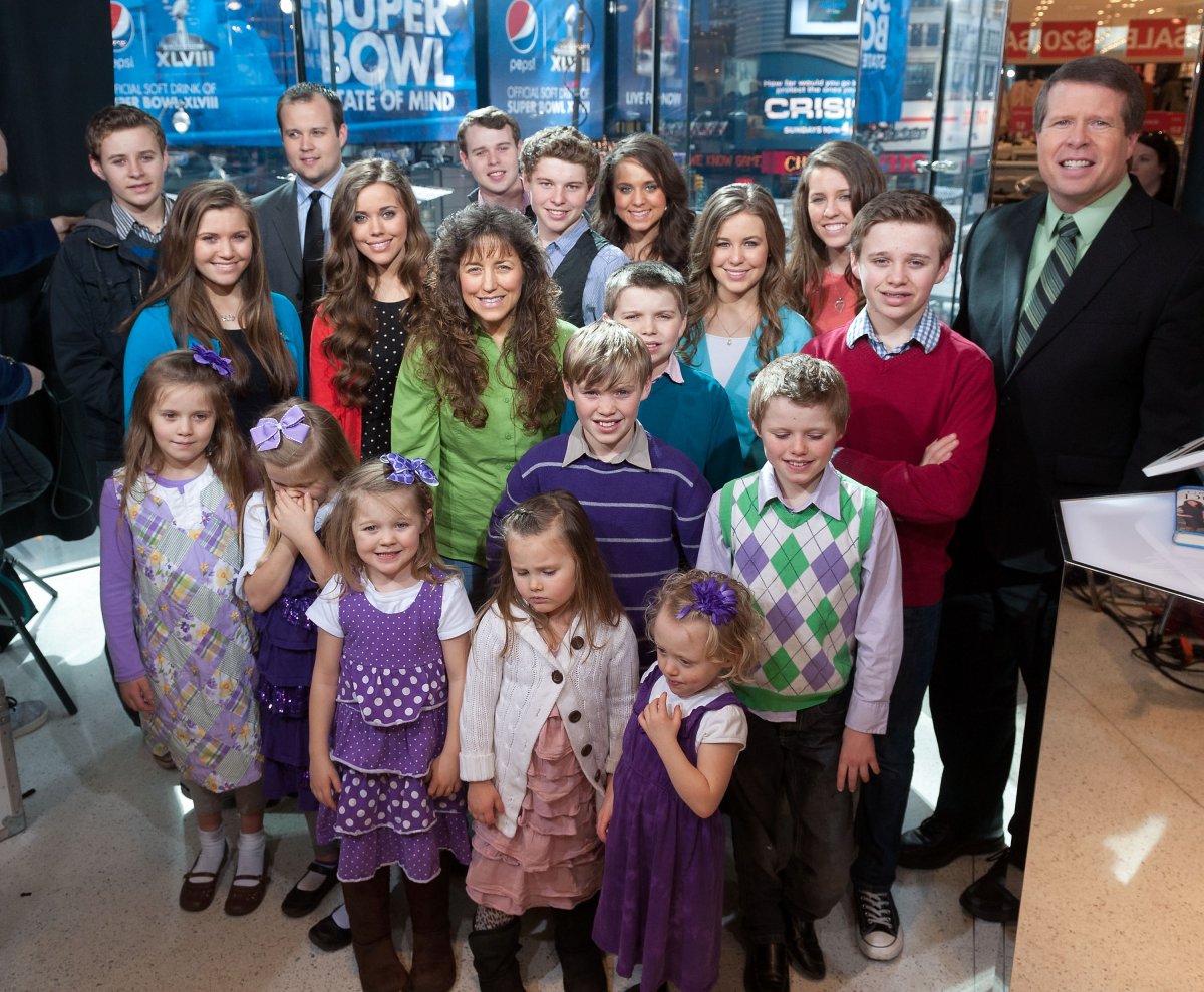 The Duggar family visits 'Extra' at their New York studios at H&M in Times Square on March 11, 2014 in New York City. 