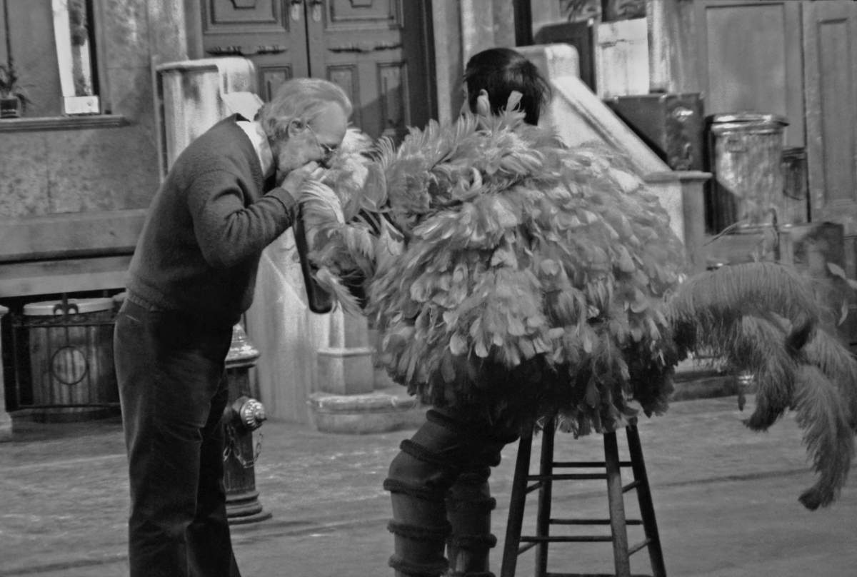 Puppeteer Caroll Spinney, in his Big Bird costume, has an adjustment made during rehearsals for an episode of ‘Sesame Street’ at Reeves TeleTape Studio in 1970 in New York City. (Photo by David Attie/Getty Images)