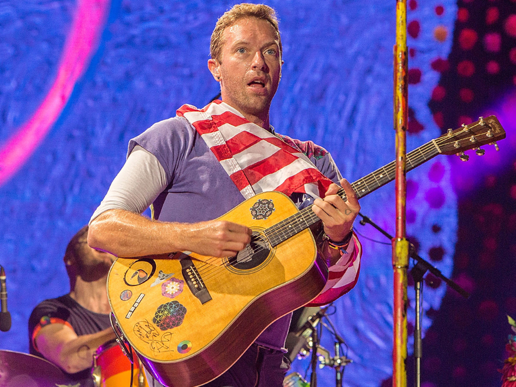 Chris Martin of Coldplay performs on stage at SDCCU Stadium on Oct. 8, 2017 in San Diego, Calif.