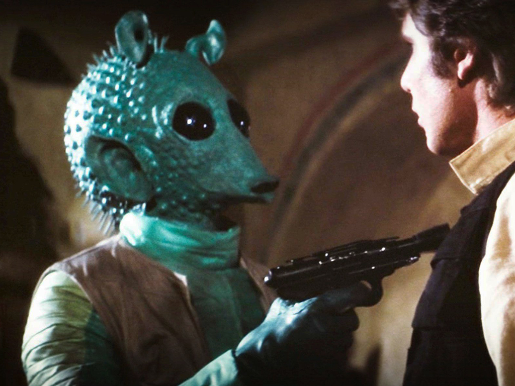 (L-R) Greedo and Han Solo (Harrison Ford) in 'Star Wars: Episode IV — A New Hope,' 1977.
