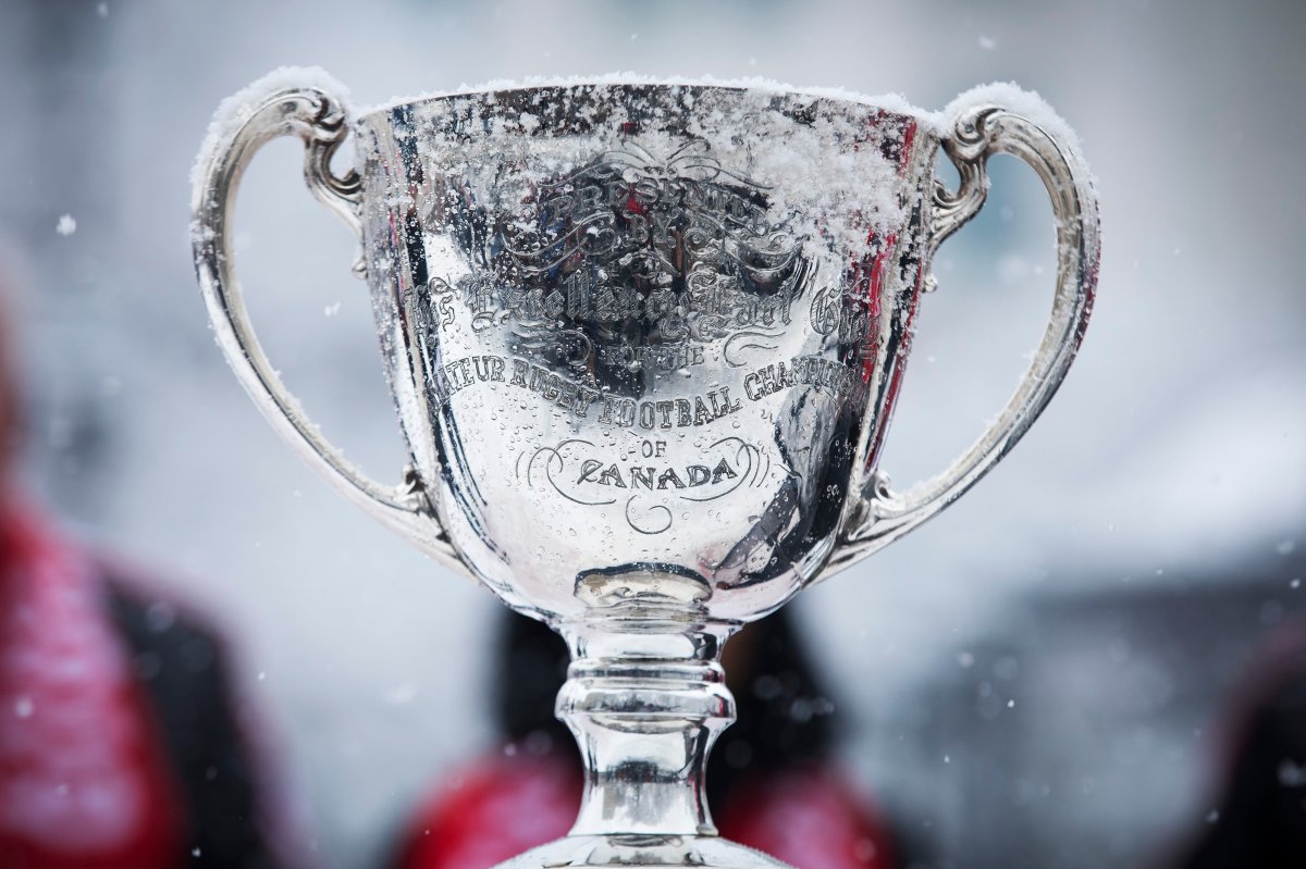 The Grey Cup sits in the falling snow upon its arrival during the CFL's Grey Cup week in Calgary, Tuesday, Nov. 19, 2019.