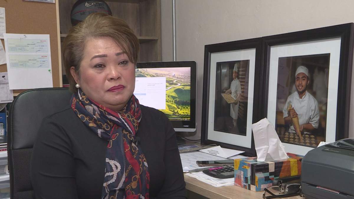 Imelda Adao's teenage son was killed in a violent home invasion on McGee Street on March 2. 