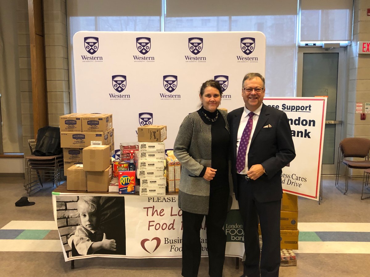 Jane Roy of the London Food Bank, and Wayne Dunn of the Business Cares Food Drive pose for a photo op at the launch of the 2019 campaign.