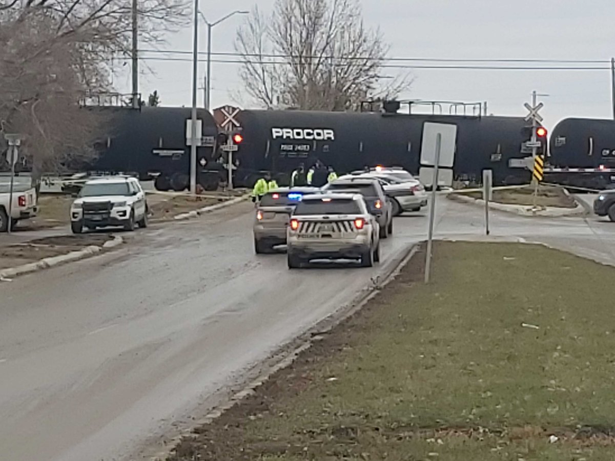 Winnipeg police and emergency personnel on scene of an incident at Panet Road and Munroe Avenue involving a train.