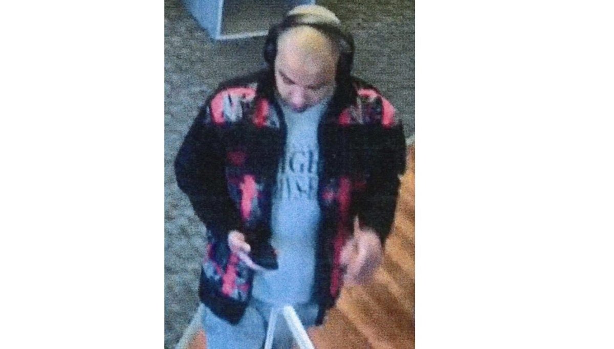 Hamilton police are looking for a suspect in connection with an alleged indecent act at a local library.