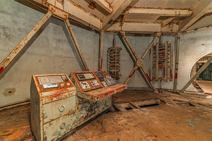 An old control panel and cushioning springs are shown inside a Titan II missile complex in Arizona.