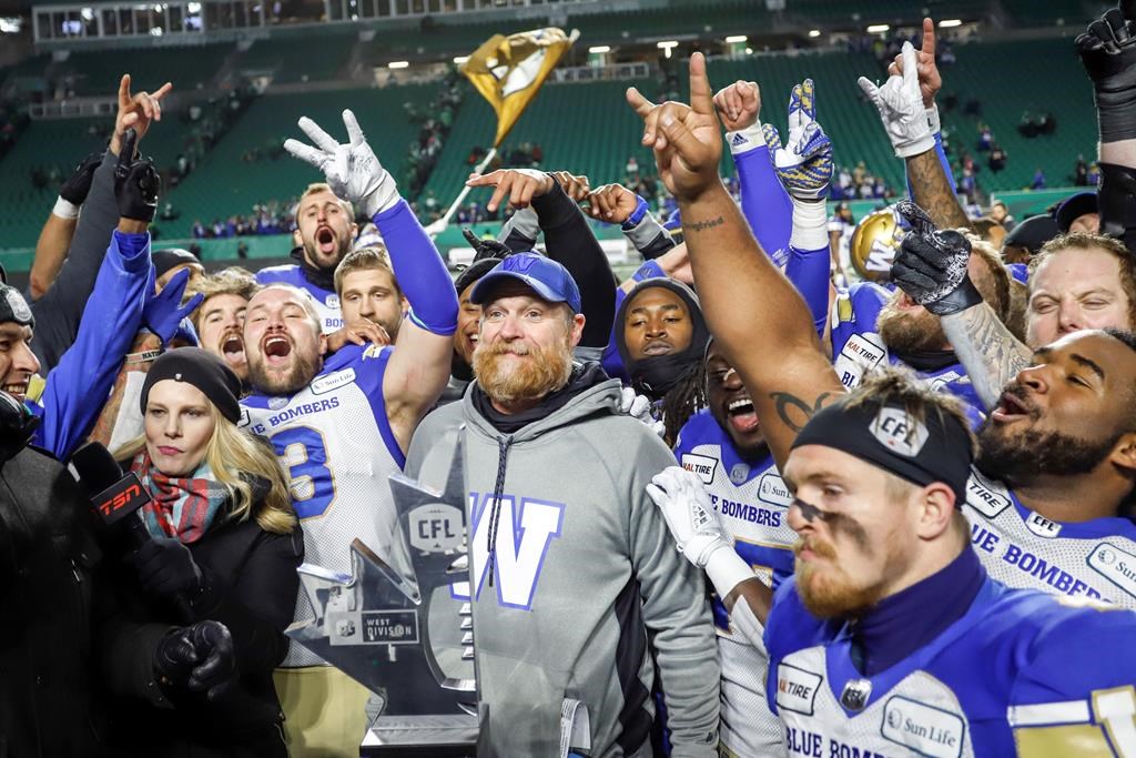 The Winnipeg Blue Bombers celebrate defeating the Saskatchewan Roughriders in the CFL West Final football game in Regina, Sunday, Nov. 17, 2019.