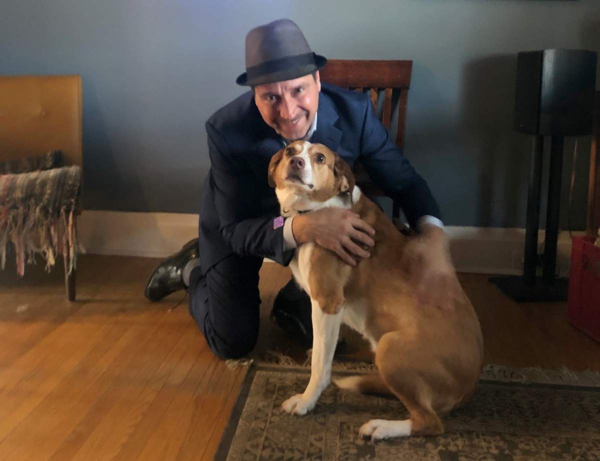 Joe Grant of LLF law firm and his dog, Molly who he adopted from the Peterborough Humane Society five years ago. The law firm is pledging $25,000 for the society's animal care centre campaign. 