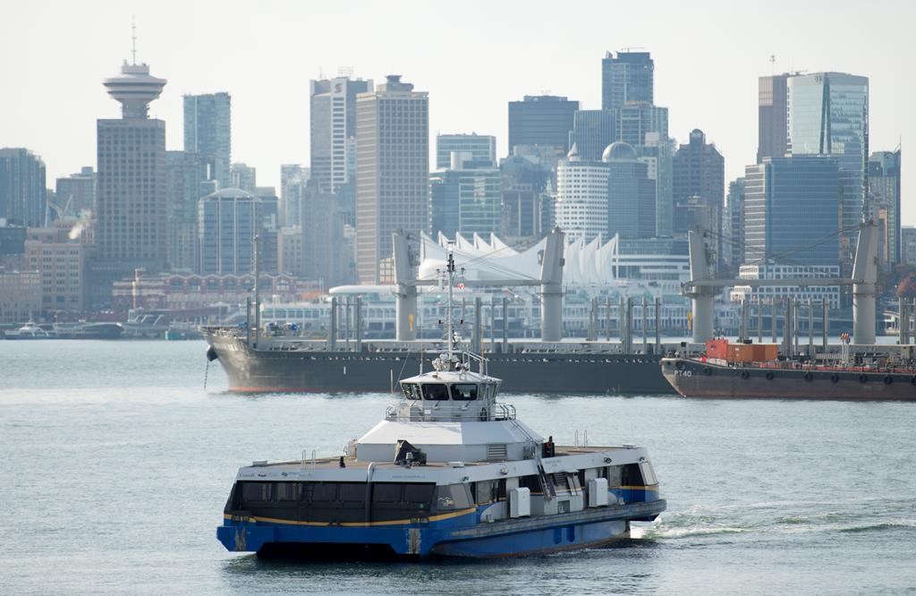 A seabus is pictured as it crosses Vancouver harbour with downtown Vancouver pictured in the background Wednesday, October, 30, 2019.