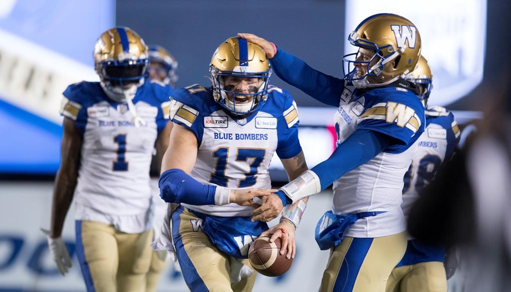 Winnipeg Blue Bombers quarterback Chris Streveler celebrates a touchdown against the Hamilton Tiger-Cats during first-half football action in the 107th Grey Cup in Calgary, Alta., Sunday, Nov. 24, 2019.