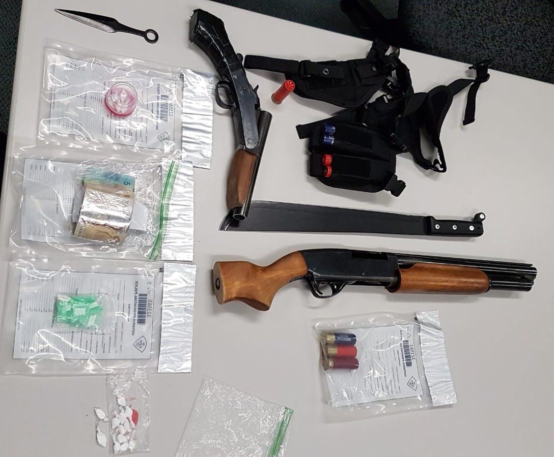 Ontario Provincial Police say they seized firearms, cocaine, and cash following an investigation which culminated with two arrests Tuesday Nov. 5, 2019.