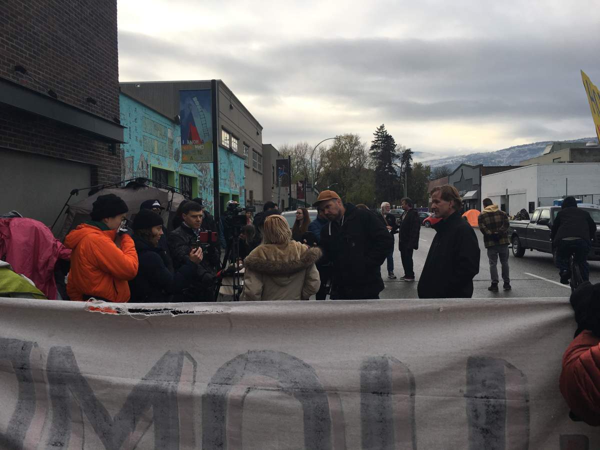 Anti-displacement advocates gathered with people experiencing homelessness in downtown Kelowna on Tuesday to call for improved living conditions.