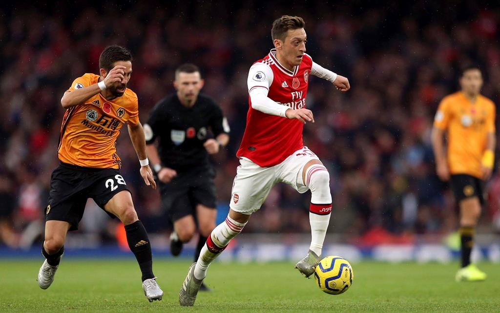 Arsenal's Mesut Ozil in action during the English Premier League soccer match against Wolverhampton Wanderers at The Emirates Stadium, London, Saturday Nov. 2, 2019.