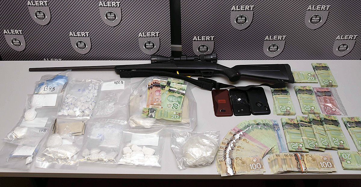 Drugs, cash and weapons are seen among the items seized after a three-month investigation into alleged drug trafficking in southern Alberta. 