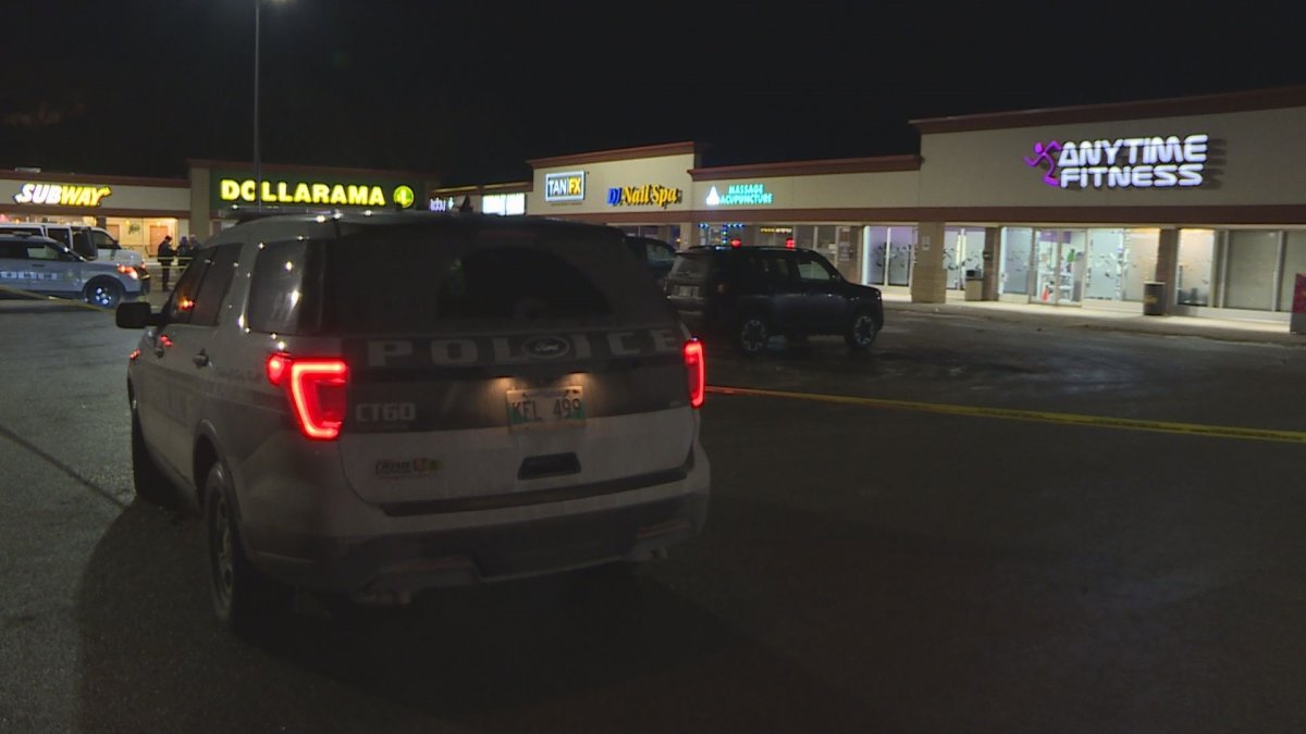 Police were on scene at a St. James strip mall Friday night.