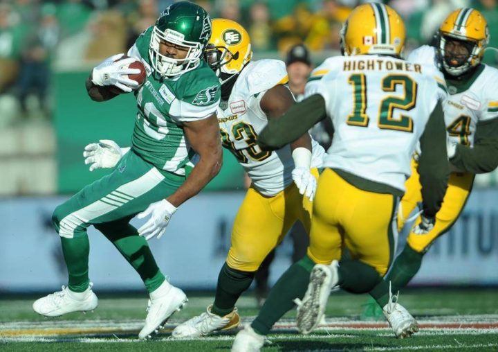 Saskatchewan Roughriders running back William Powell tries to spin away from a tackle during first half CFL action against the Edmonton Eskimos at Mosaic Stadium in Regina on Saturday, Nov. 2, 2019. THE CANADIAN PRESS/Mark Taylor.