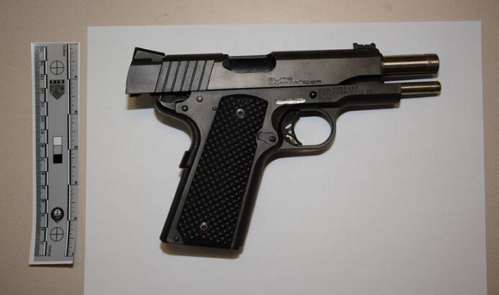 Toronto police say a 26-year-old man is facing weapons charges after being found in possession of a handgun pistol in the city's north end. 