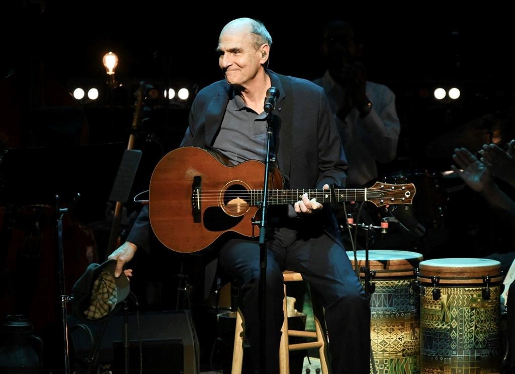 James Taylor performing at JONI 75: A Birthday Celebration in Los Angeles. in 2018. Taylor's concert planned for Winnipeg Thursday has been postponed due to COVID-19.