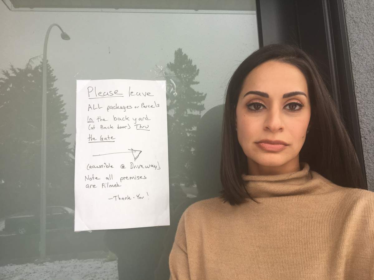 Calgary family puts up sign to try and discourage so-called porch pirates.