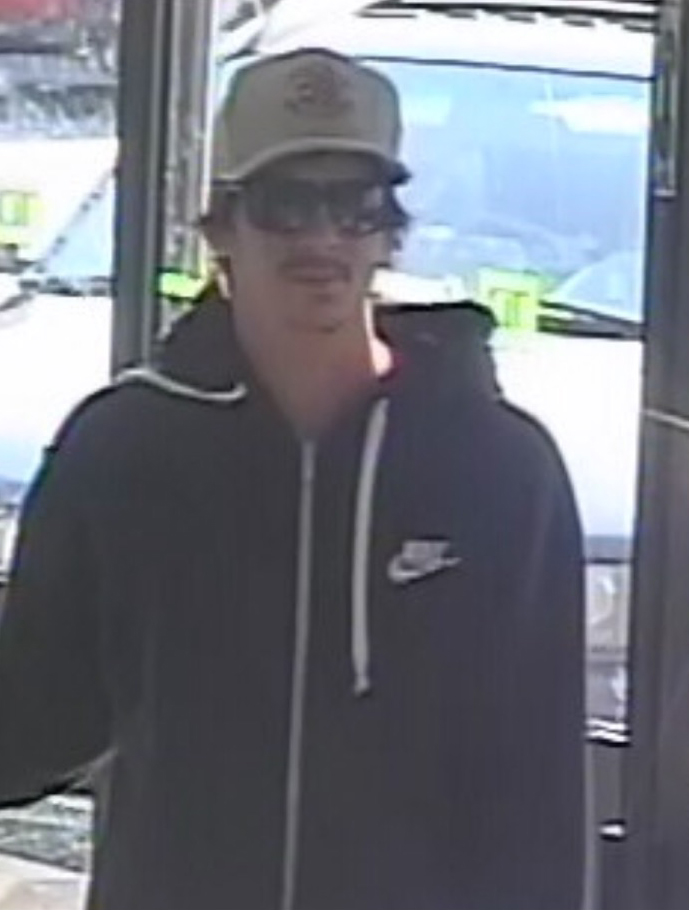 Peterborough police seek to identify this individual as part of an investigation into bank fraud.