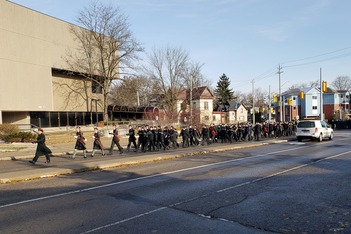 The annual Remembrance Day march travels down Frederick Street in Kitchener in 2018.