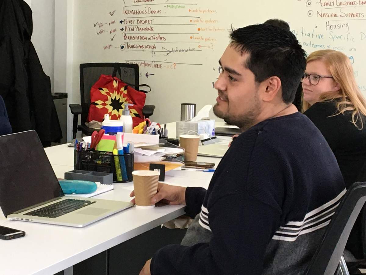 Darin Richard is seen talking with members of Winnipeg Boldness.