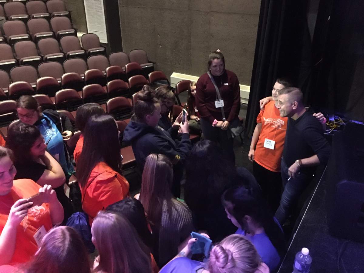 Sean McCann, formerly of Great Big Sea, meets students, following a performance on Oct. 18 in  Clarenville, N.L.