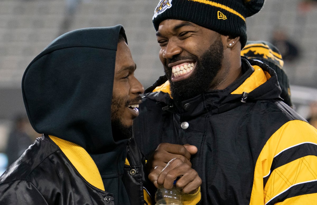 Hamilton Tiger Cats' Brandon Banks, left, and Simoni Lawrence in warm-up before their game against the Argonauts,  Nov. 2, 2019.