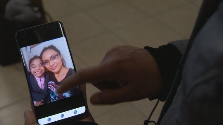 Alma Rope displays a picture on her phone of Skyrah.