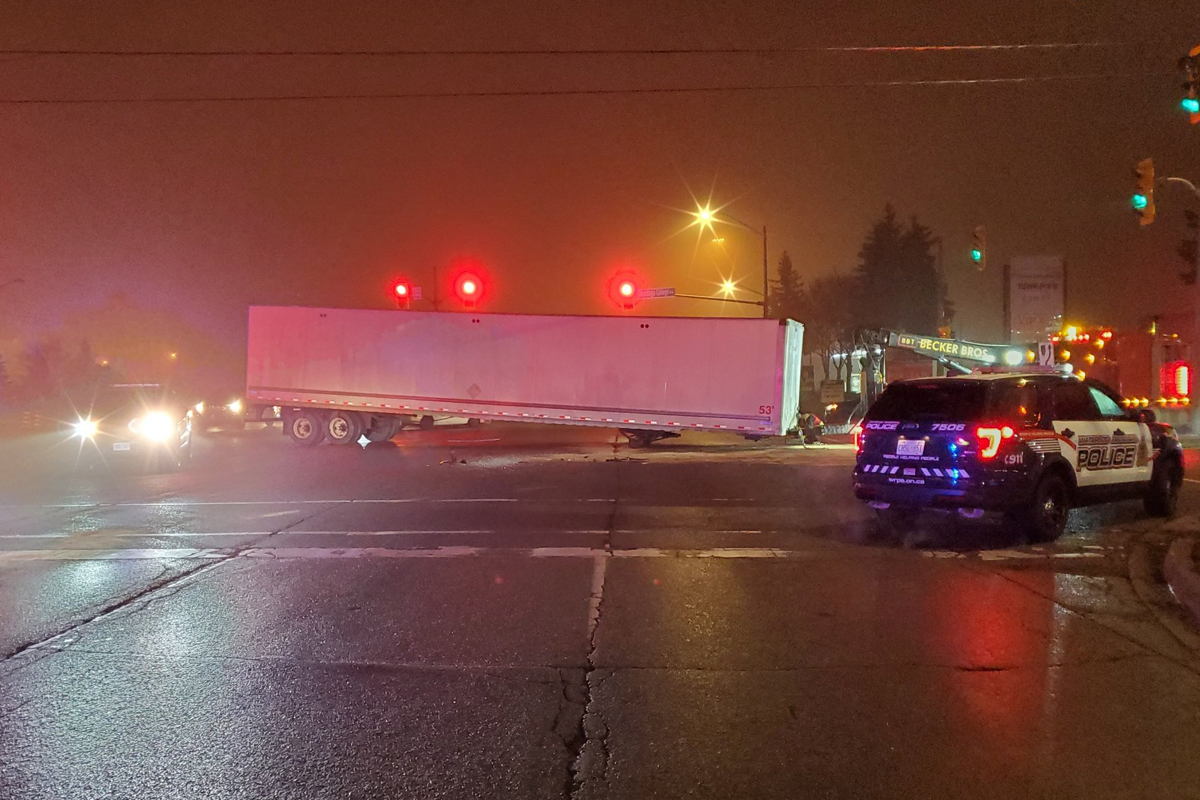 A trailer from one of the trucks came to rest in the intersection of Homer Watson and Conestoga College boulevards.