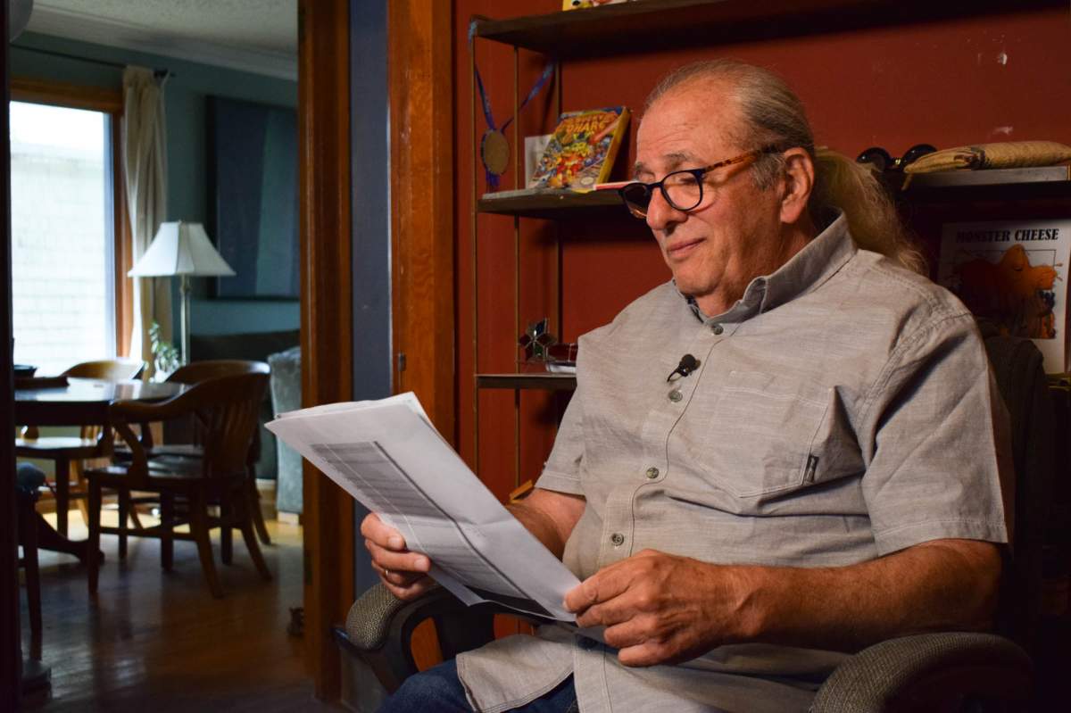 Steve Wolfson reviews the results of his drinking water quality test. Wolfson’s results show lead exceedances in the water at his Regina home, where he lives with his wife and two young grandchildren. (Mackenzie Lad)