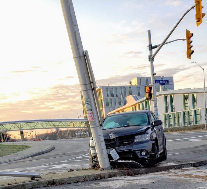 Ottawa police say crews are still doing repairs at Woodroffe Avenue and Navaho Drive after a van slammed into a pole on Monday morning.