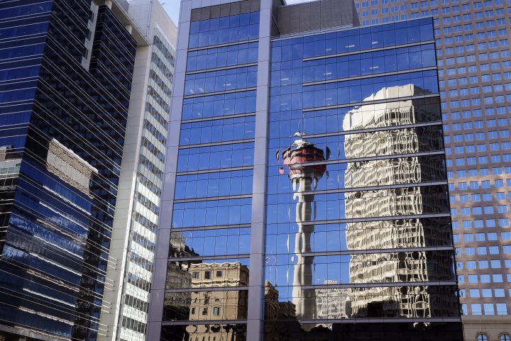 The Calgary Tower reflected on office building windows in downtown Calgary, Alberta on Dec. 22, 2014.