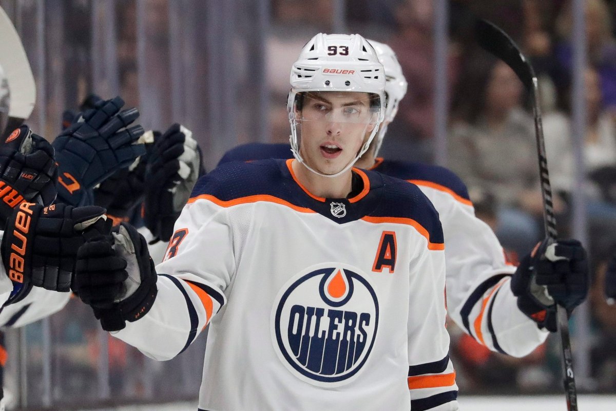 Edmonton Oilers center Ryan Nugent-Hopkins celebrates after scoring against the Anaheim Ducks during the second period of an NHL hockey game in Anaheim, Calif., Sunday, Nov. 10, 2019. (AP Photo/Chris Carlson).
