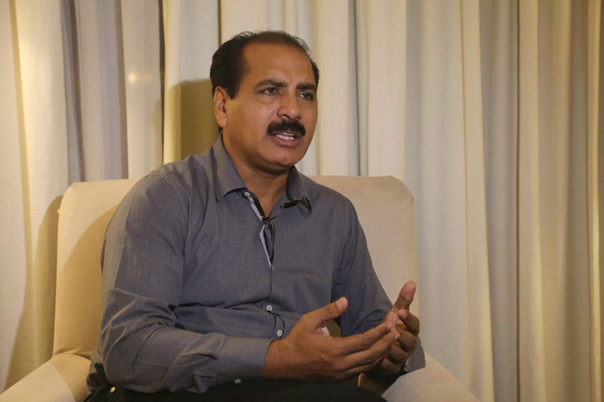 In this Nov. 11, 2019 photo, Christian activist Saleem Iqbal talks to The Associated Press regarding Pakistani brides trafficked to China, in Faisalabad, Pakistan.