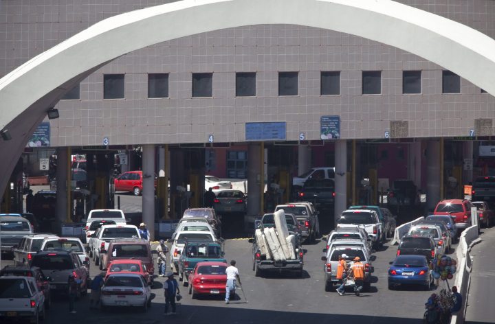This file photo shows vehicles waiting to enter the U.S. through The Dennis DeConcini Port of Entry in downtown Nogales, Ariz. 