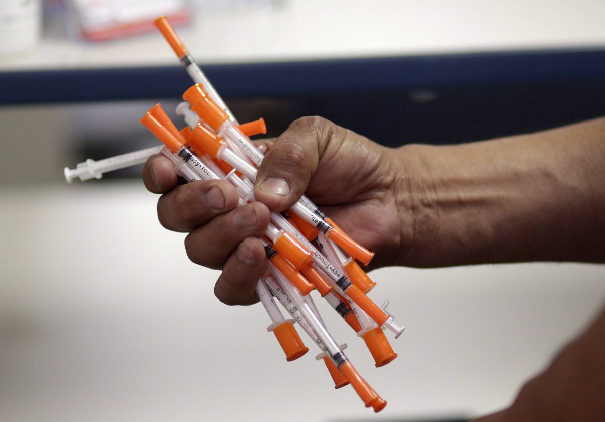 Used needles are shown at a needle exchange in Miami, May 6, 2019. A constitutional challenge to the federal government's refusal to provide clean needles in prisons is set to be heard by an Ontario court this week. 