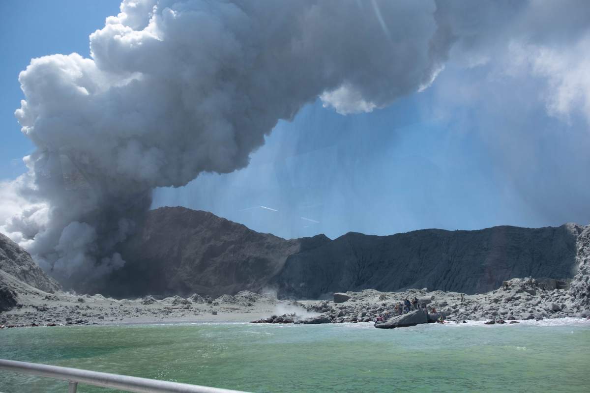 An image provided by visitor Michael Schade shows White Island (Whakaari) volcano, as it erupts in the Bay of Plenty, New Zealand, on Dec. 9, 2019.